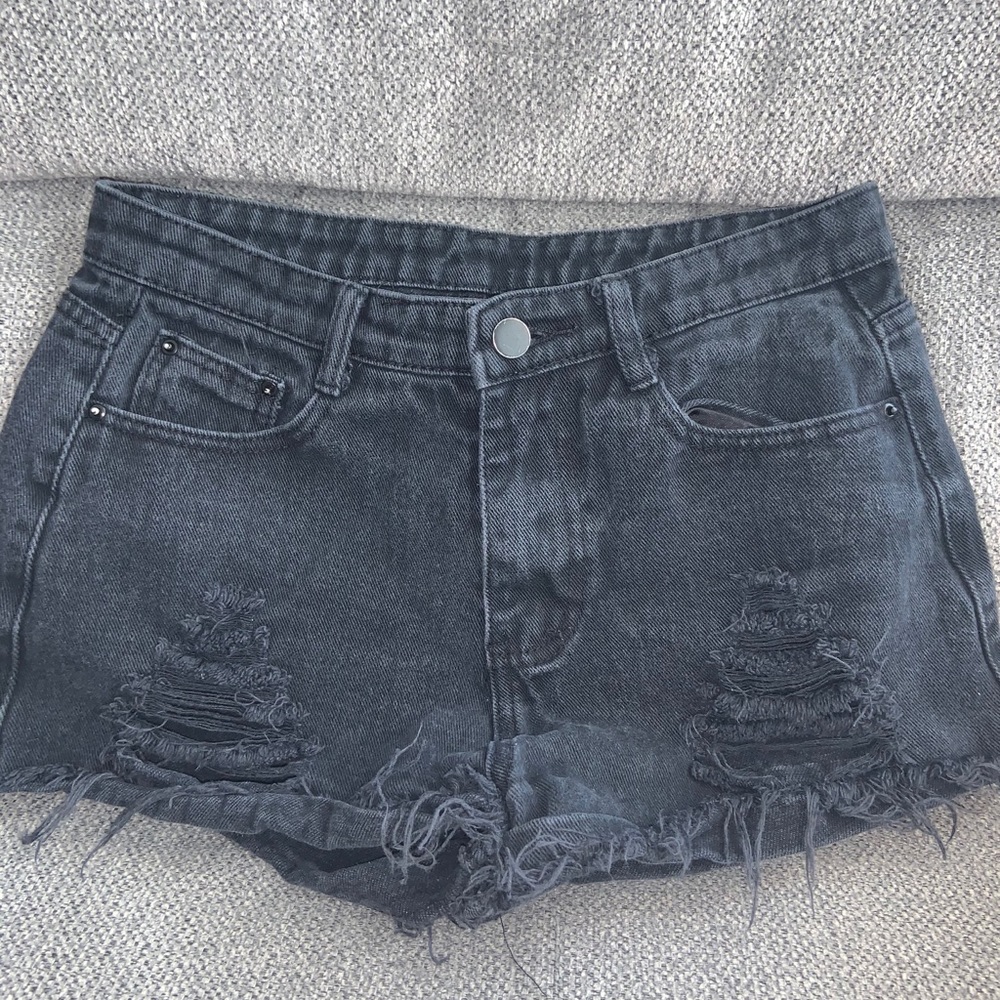 black ripped jean shorts !!